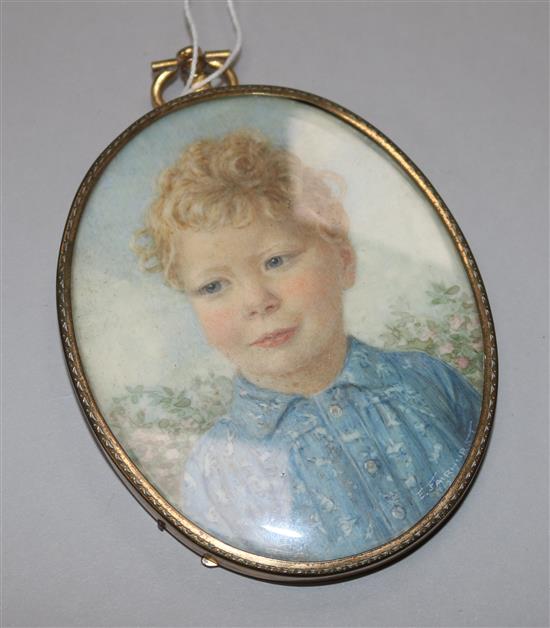 A portrait miniature of a boy and a candelabra stamped 925
